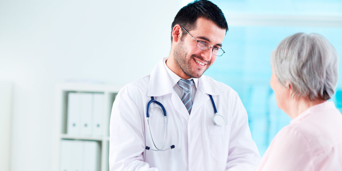 Doctor consulting with patient